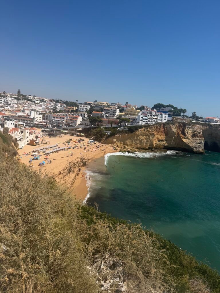 Carvoeiro beach and the white town seen from the cliffs above the turquoise sea