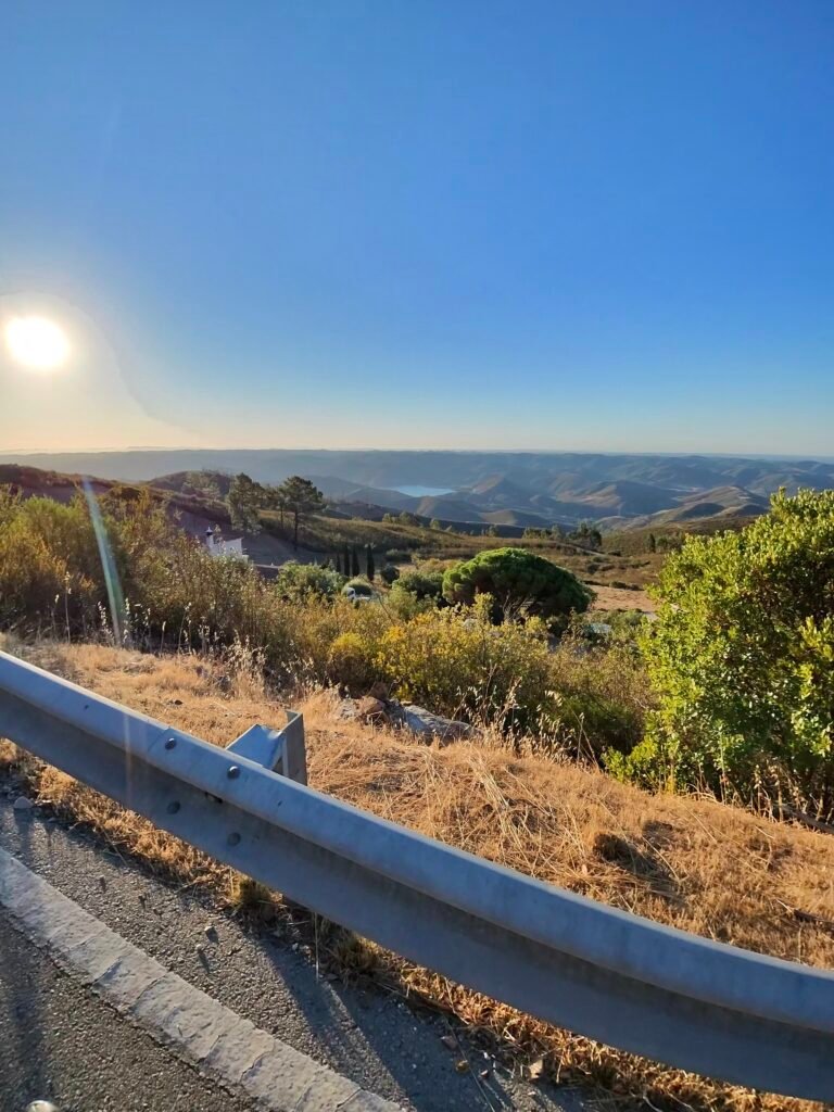 View over the serra from near the top of the climb up to Alferce, with a crash barrier in the foreground