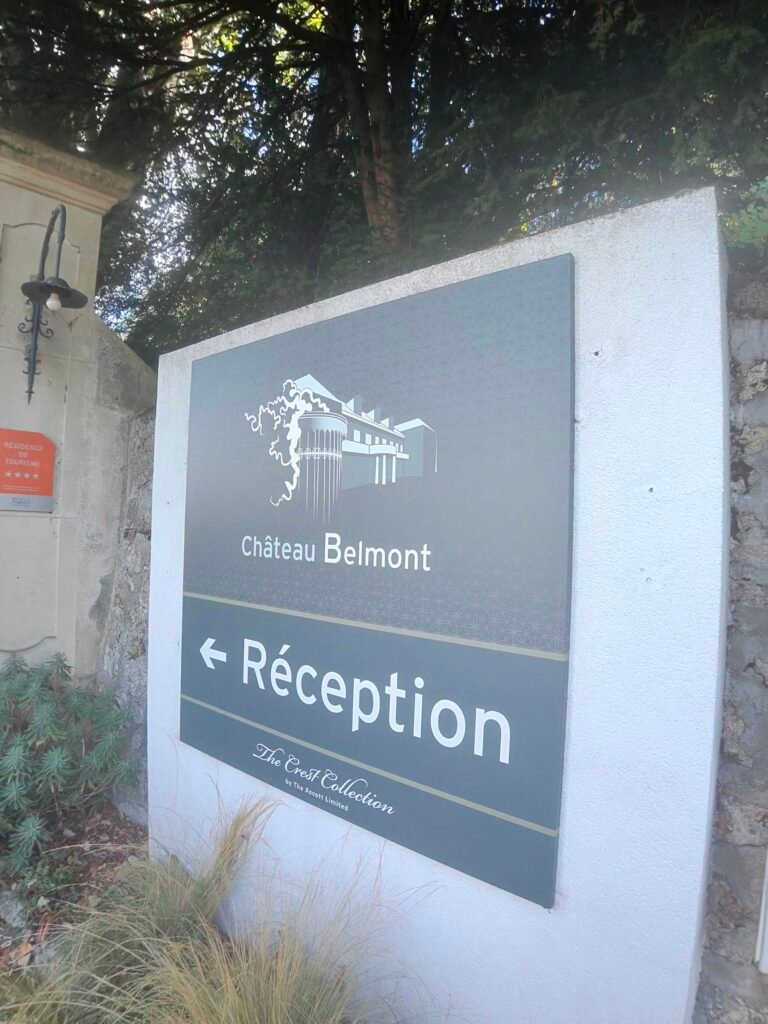 The Château Belmont sign at the hotel gates in Tours at the end of the ride